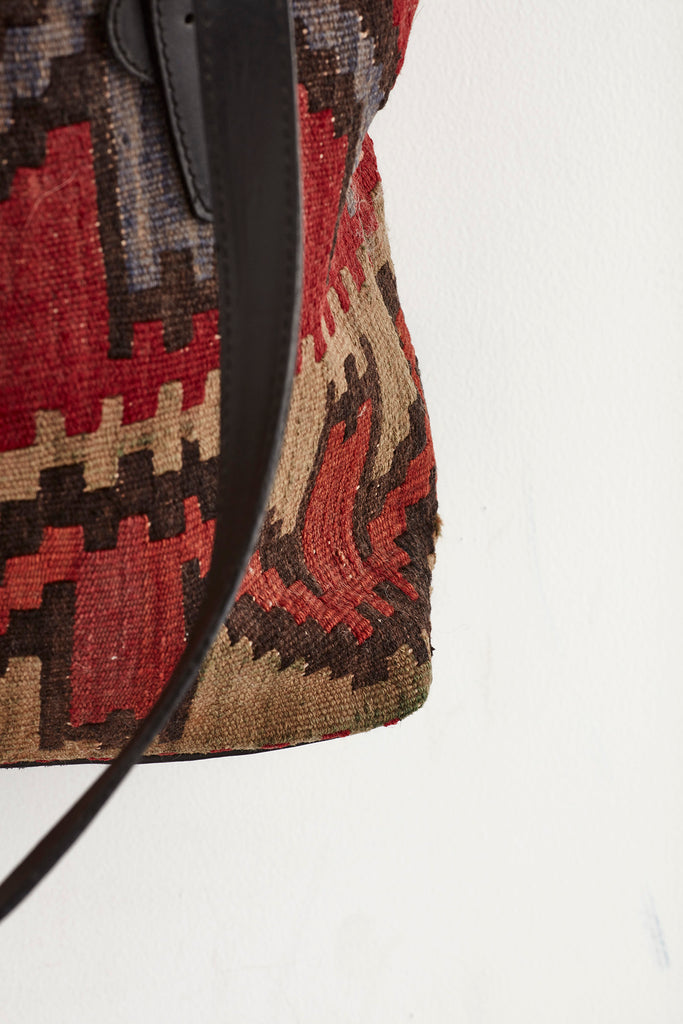 Red and brown medium kilim and leather handbag colour detail