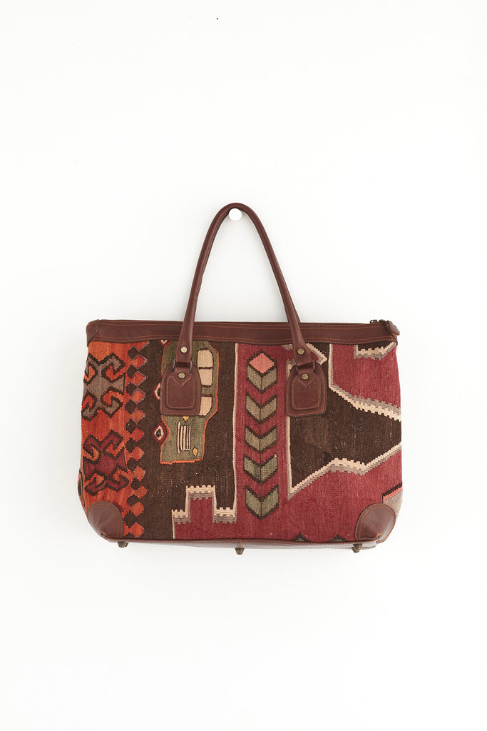 Red and brown large kilim and leather weekend bag front