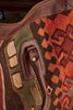 Red and brown large kilim and leather weekend bag handle detail