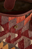 Multi coloured large kilim and leather handbag latch detail