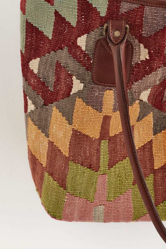 Multi coloured large kilim and leather handbag colour detail