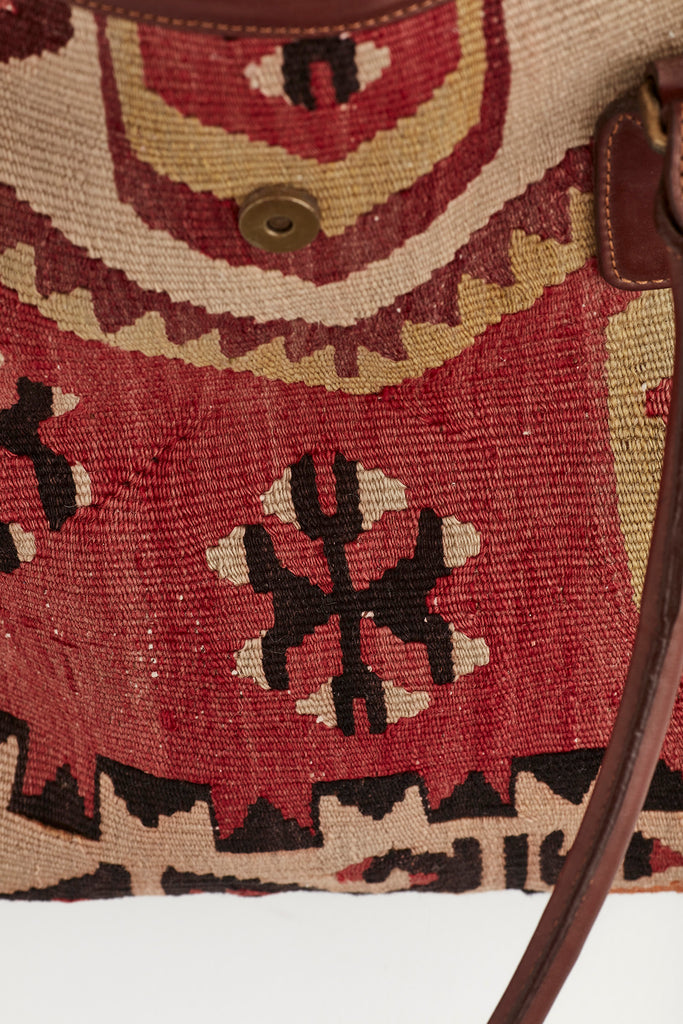 Red and brown large kilim and leather handbag colour detail