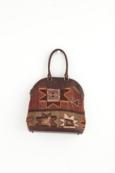 Multi coloured large kilim and leather handbag front