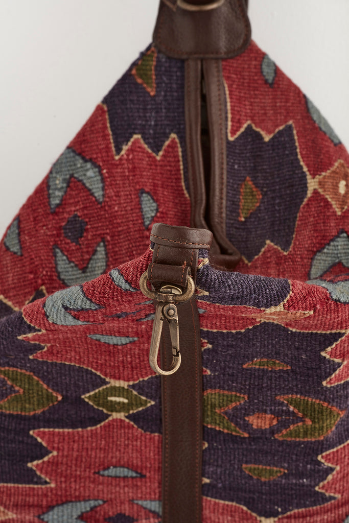 Multi Coloured kilim and leather convertible backpack handbag clip and opening detail