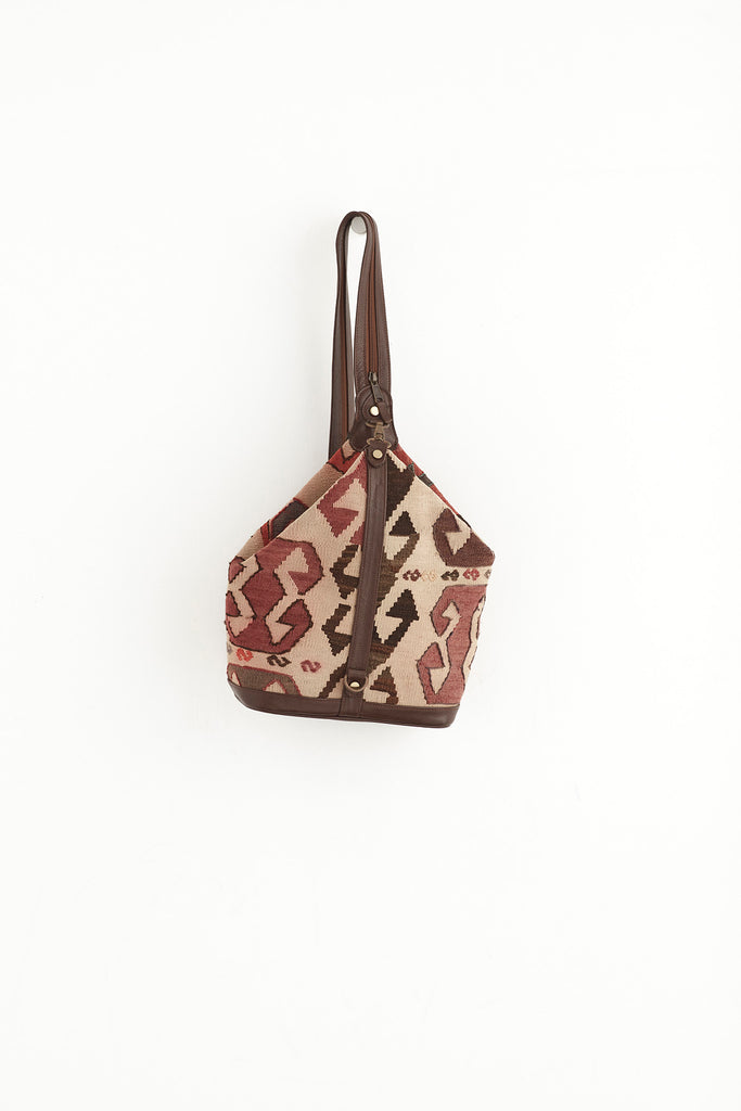 Cream, red and brown kilim and leather convertible backpack handbag front