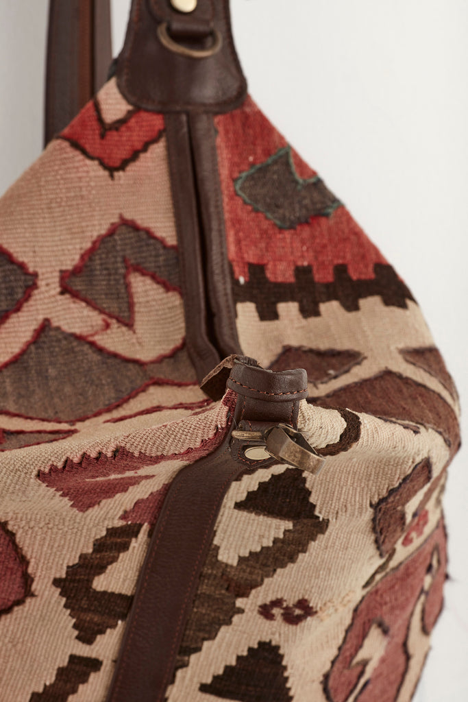 Cream, red and brown kilim and leather convertible backpack handbag top opening detail
