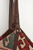 Multi coloured kilim and leather convertible backpack handbag clip and zipper detail